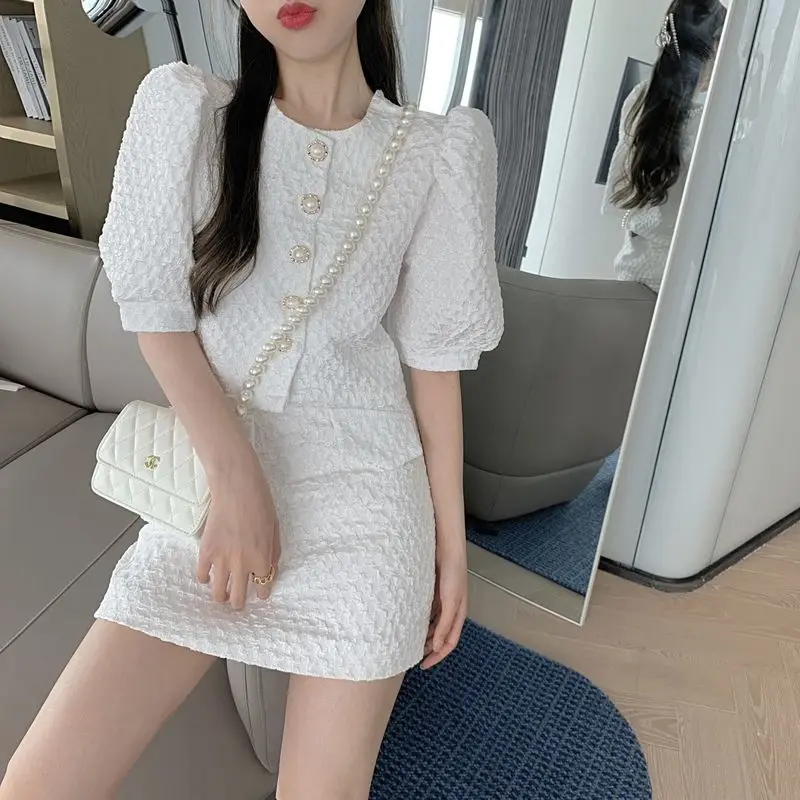

2022 Women Summer New Skirt Suits Female Fashion Solid Color O-neck Crop Top + Mini Skirts Ladies Set Two Piece Outfits Y159