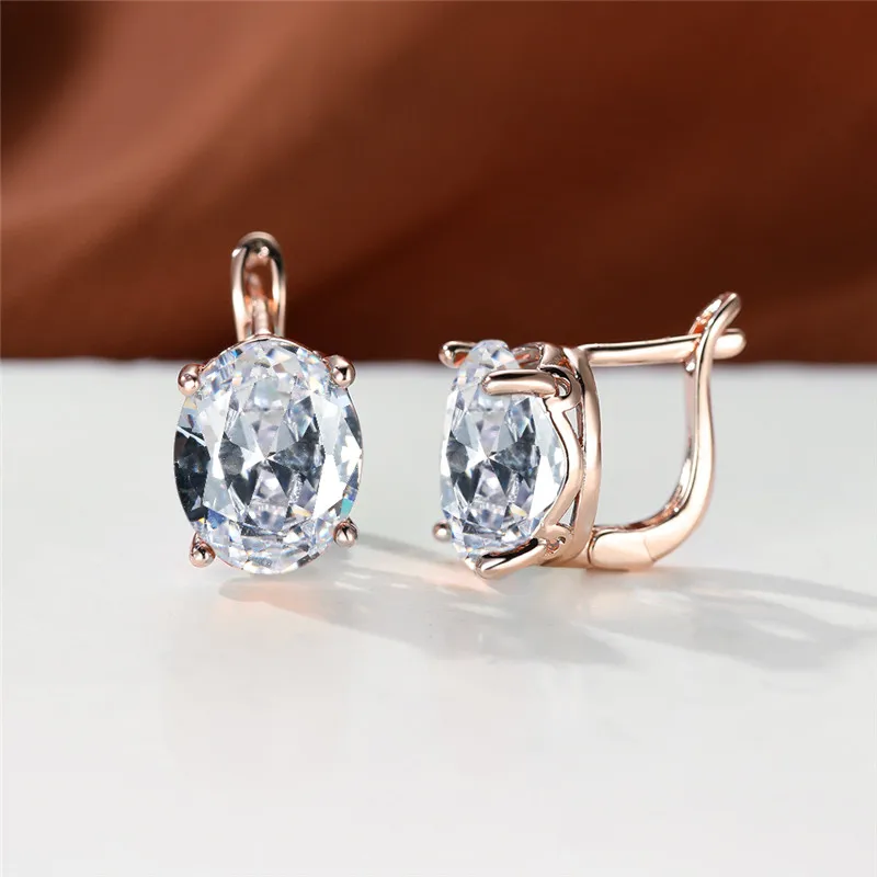 Серьги с радужными кристаллами и овальным камнем Разноцветные серьги цвет под