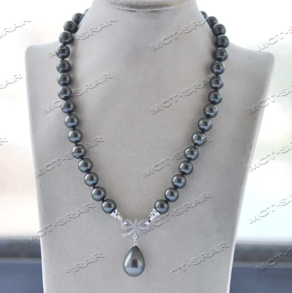 

MCT·STAR Z12034 19'' 20mm Black Round Shell Pearl Necklace Drop Pendant Bowknot CZ