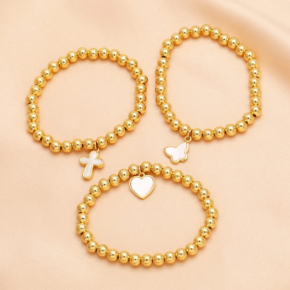 FLOLA простые позолоченные браслеты Newlyn с крестом для женщин цепочка из бисера