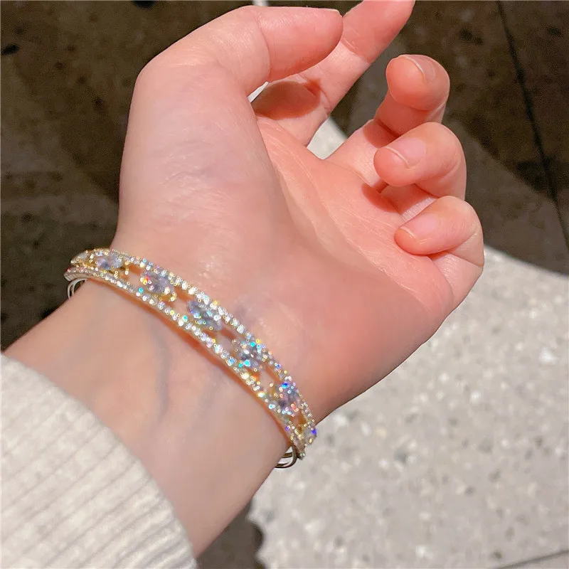 CC Браслет-манжета для женщин 14K позолоченный овальной формы белый цирконий