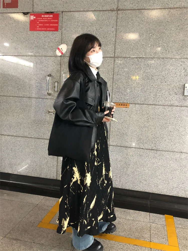 Высококачественное текстурированное кожаное пальто на молнии с лацканами