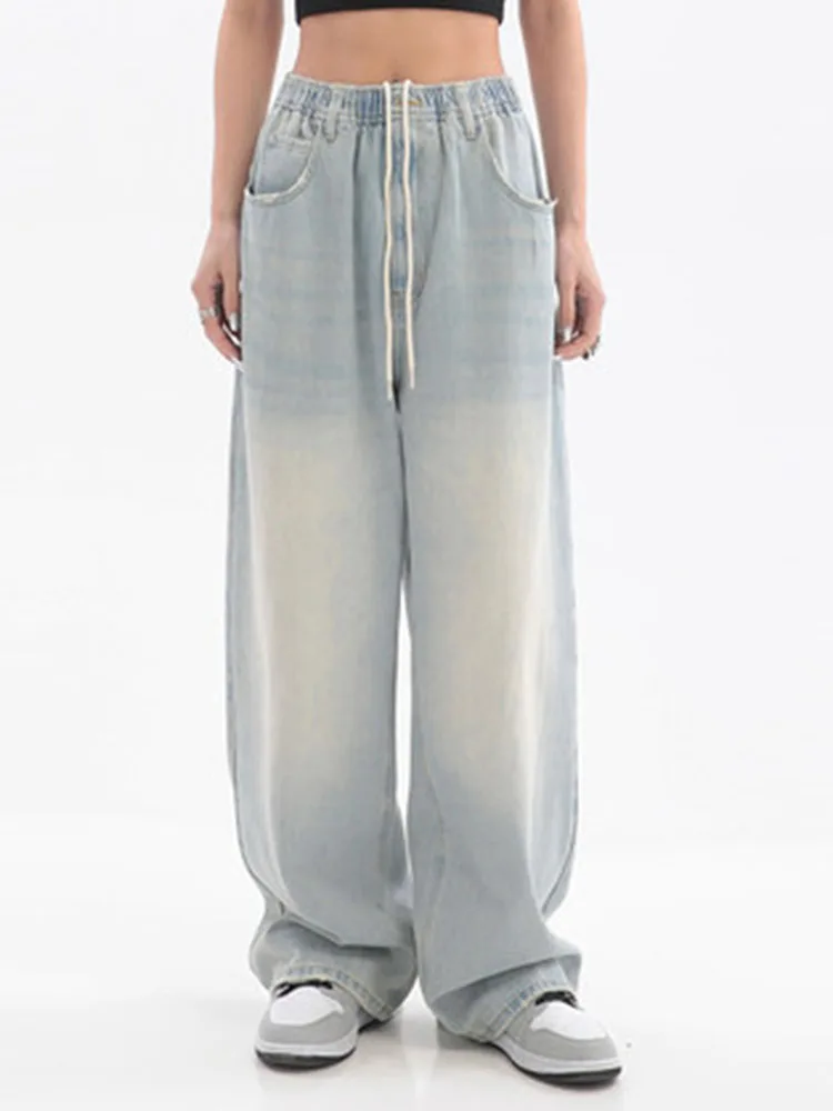 Женские мешковатые джинсы с эластичным поясом на завязках и широкими штанинами -