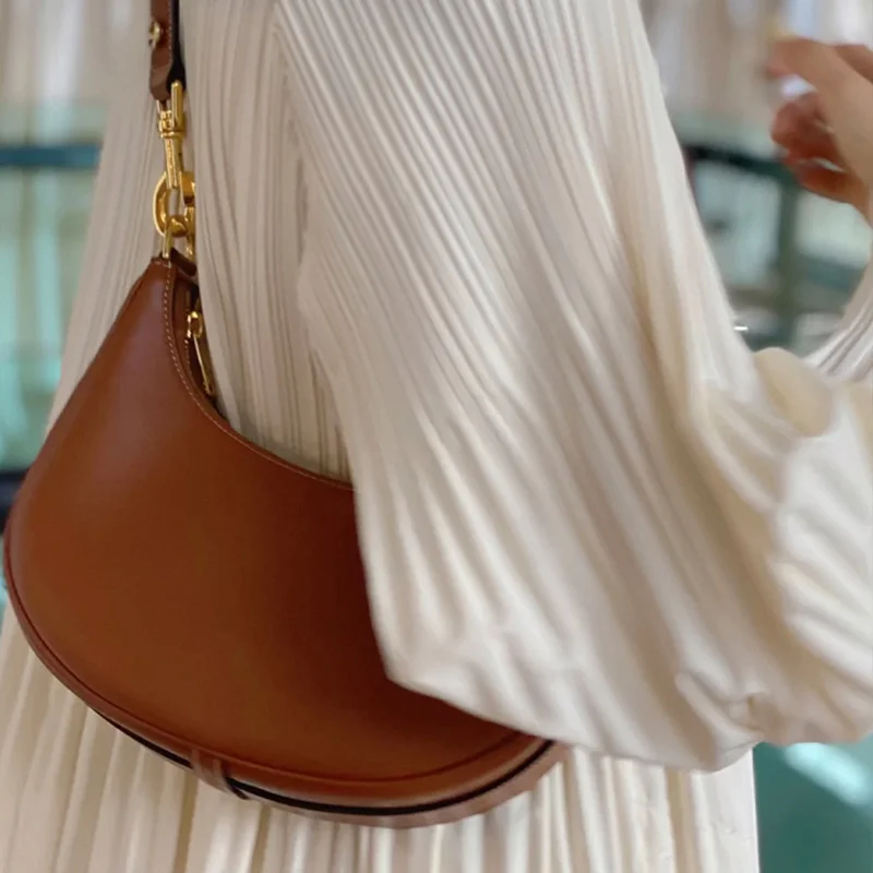 

Женская сумка для подмышек из воловьей кожи с полумесяцем и Авами