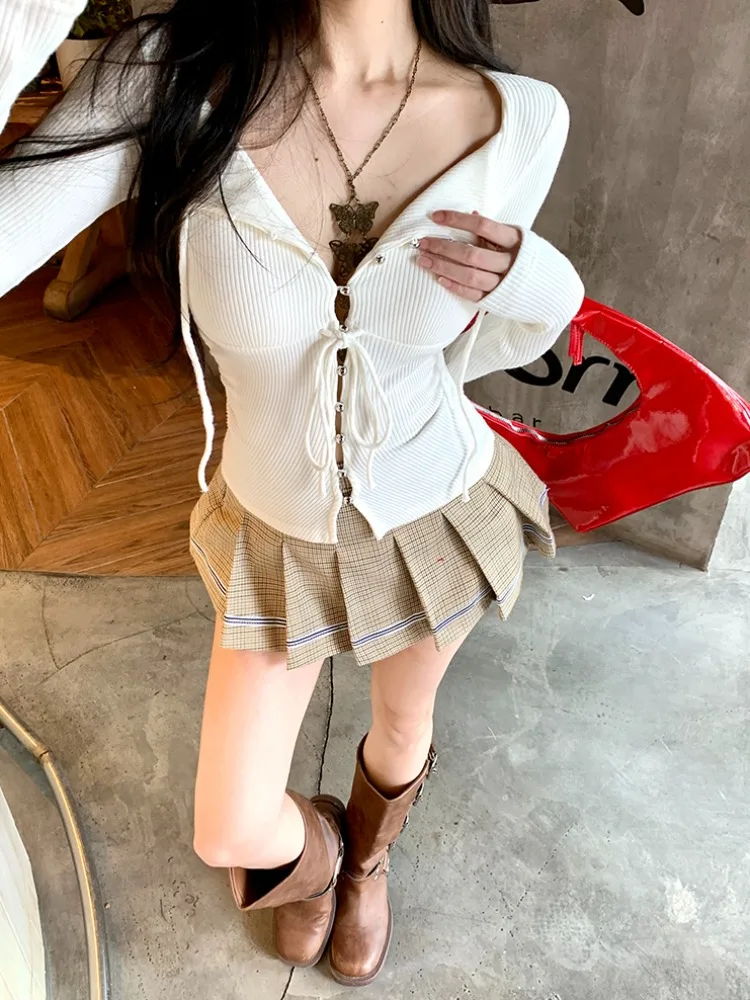 Осень и зима Популярный в этом году белый топ со шнуровкой v-образным вырезом