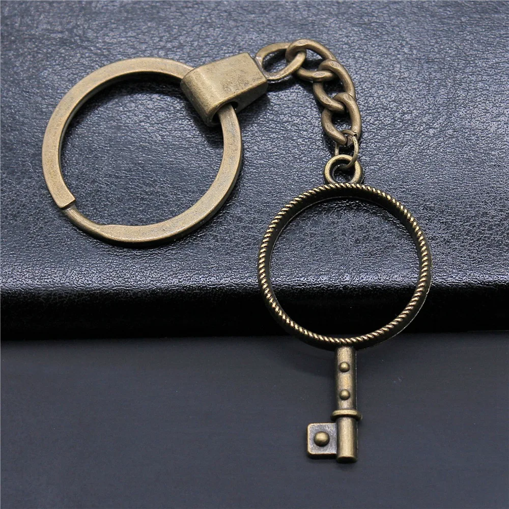 

Модный брелок в античном стиле бронзового цвета, 46x25 мм, брелок в форме ключа, металлическая рамка, подвеска, брелок, мужское ювелирное издел...
