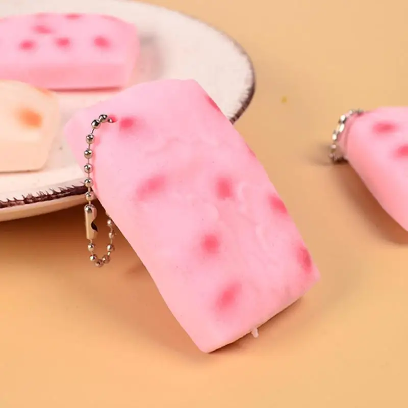 

Розовый декомпрессионный артефакт, сжимаемые игрушки для снятия стресса, прочный и долговечный желтый рисовый торт, гибкий материал с медленным восстановлением формы