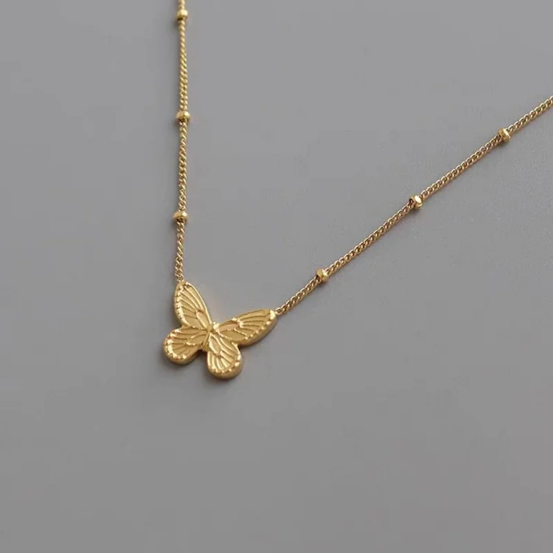 Ожерелье с подвеской в виде бабочки бусинами позолота 18 карат