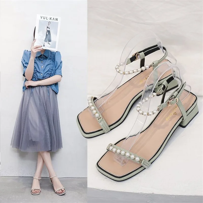 

Sandals 2021 new female summer open toe all-match fairy style pearl thick heel high heel French one-way buckle shoes sandals