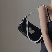 2022 niche womens bags cool girl butterfly pearl shoulder bag patent leather underarm bag versatile handbag cross body bag