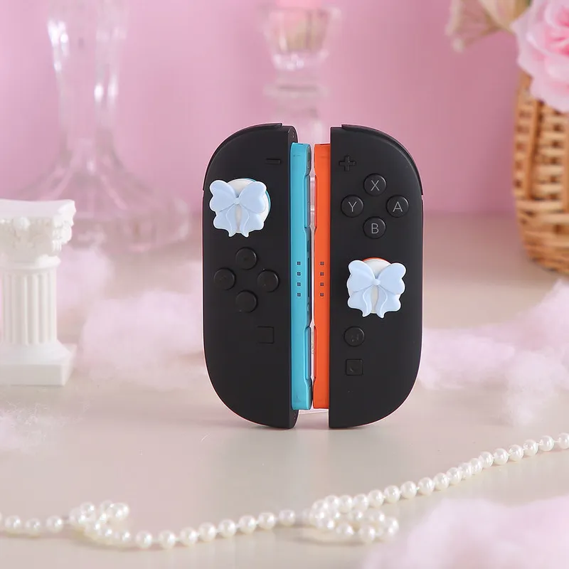 Милые накладки на джойстики с бантиком для Nintendo Switch 2, мягкие силиконовые защитные чехлы для джойстиков, аксессуары для игровых контроллеров. (art.: 3920dd2a36bf0) - 3920dd2a36bf0