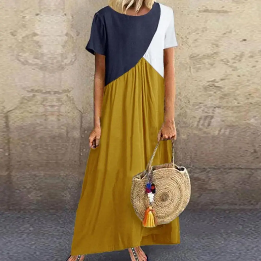 

Женское платье в стиле пэчворк контрастных цветов с коротким рукавом