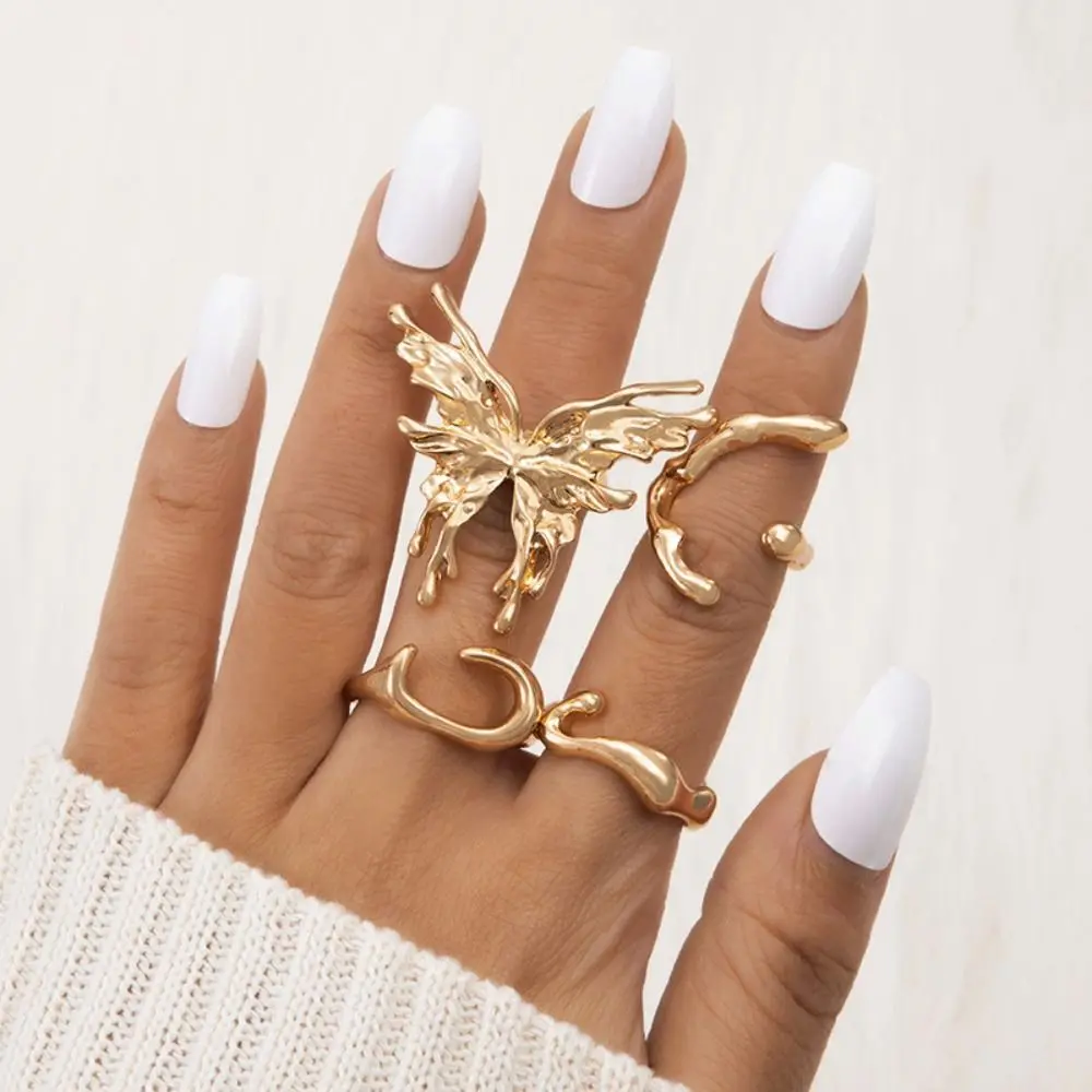 

4pcs/set Punk Silver Color Liquid Butterfly Rings For Women Fashion Irregular Wave Metal Knuckle Rings Gothic Jewelry