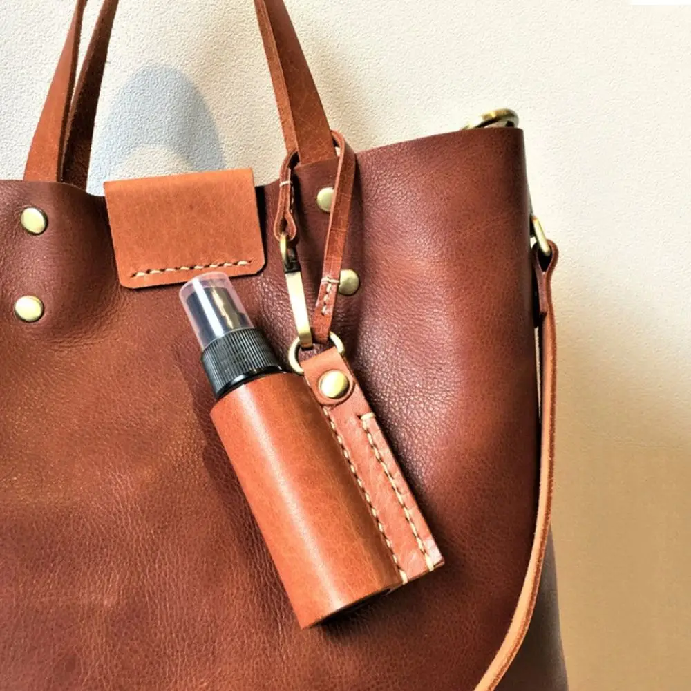 

60ml Portable Hand Sanitizer Spray Bottle Reusable Bottle Hand Washing Storage Bottle with Keychain Holder Leather Case