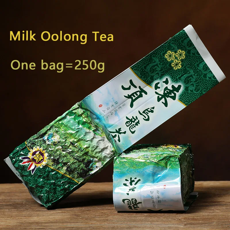 

Chinese Taiwan Milk Oolong Tea Beauty Weight loss Lowering Blood Pressure High Mountains JinXuan Oolong Tea Fresh Green teapot