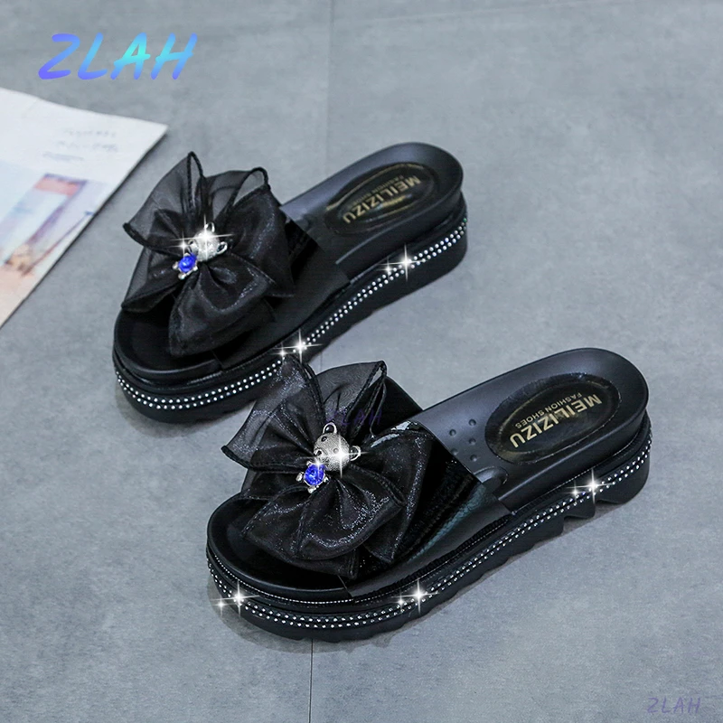 

Новинка, модные летние женские тапочки, пляжная обувь с большим бантом и цветами, женские сандалии на плоской подошве с открытым носком, жен...