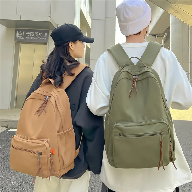 

2023 Spring New Solid Color Large Capacity Backpack Street Trend Student Couple Backpack