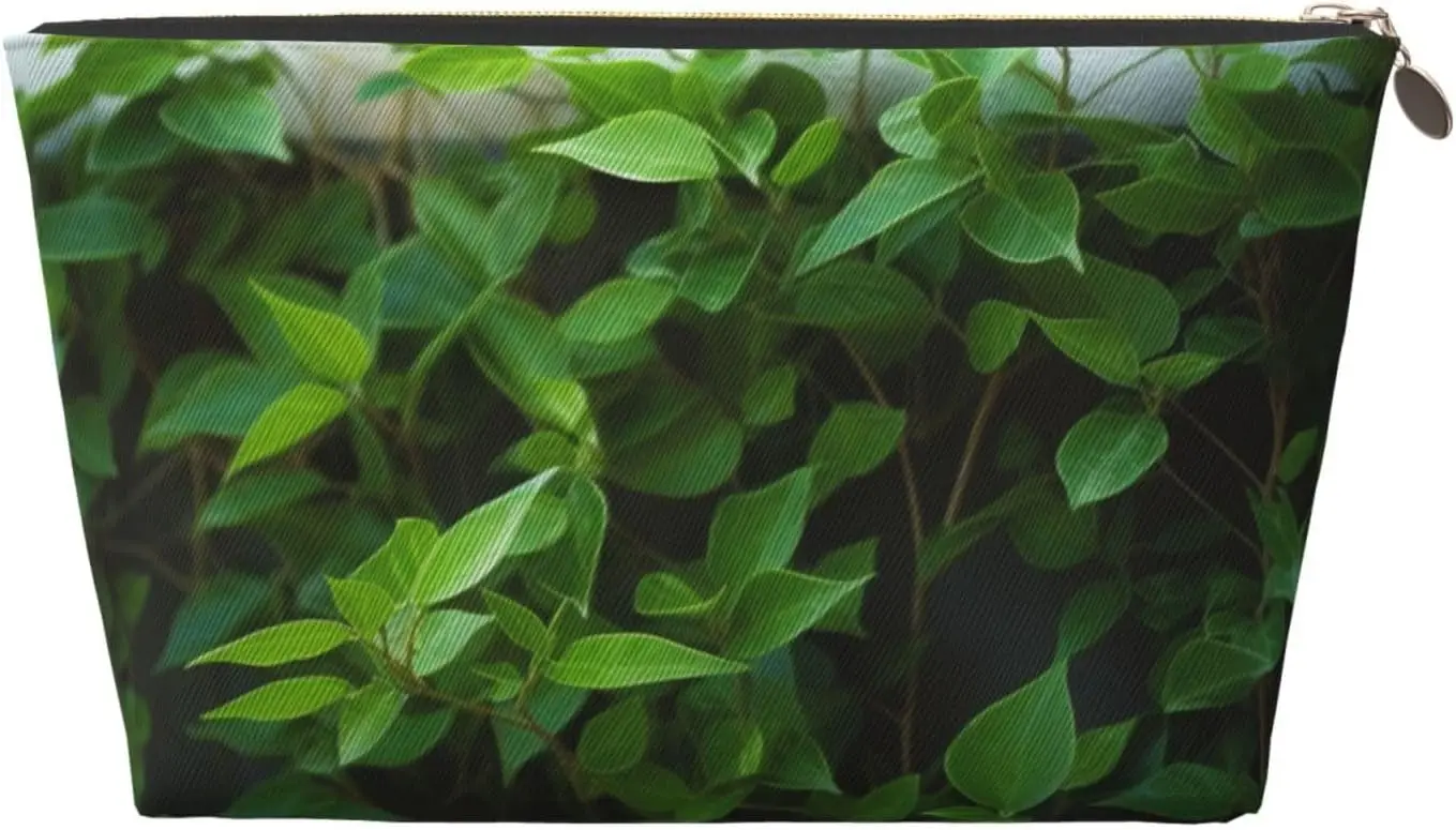 Кожаная дорожная косметичка с зеленым растительным принтом