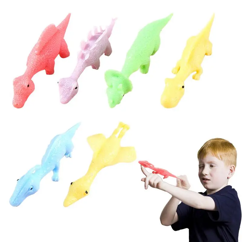 

Dinosaur Finger Toys Dinosaur Shape Dino Figures Sling Shot Toys 6Pcs Sensory Fidget Toys Party Favors Funny Gag Gifts Flying