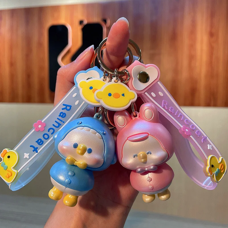 

Creative cute raincoat duck keychain personalized PVC doll bag pendant car ornaments gift wholesale