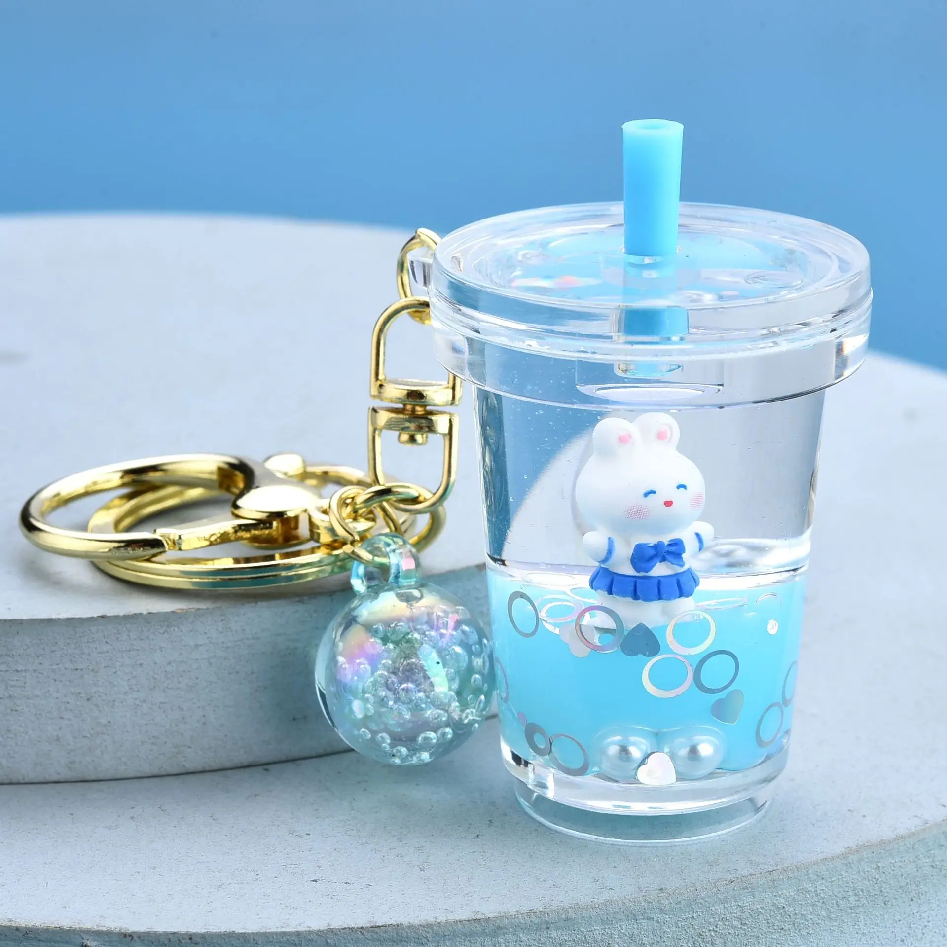 

Floating oil Liquid Milk Tea Cup Rabbit Doll Keyring Keychain Floating Bunny Key Chains Women Charm Bag Pendant Car Key Ring