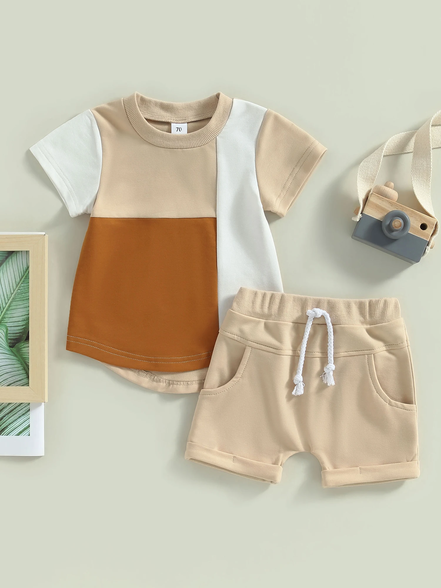 

Cute and Stylish Toddler Boy Summer 2-Piece Outfit Short Sleeve Patchwork Top with Elastic Drawstring Shorts and Pocket -