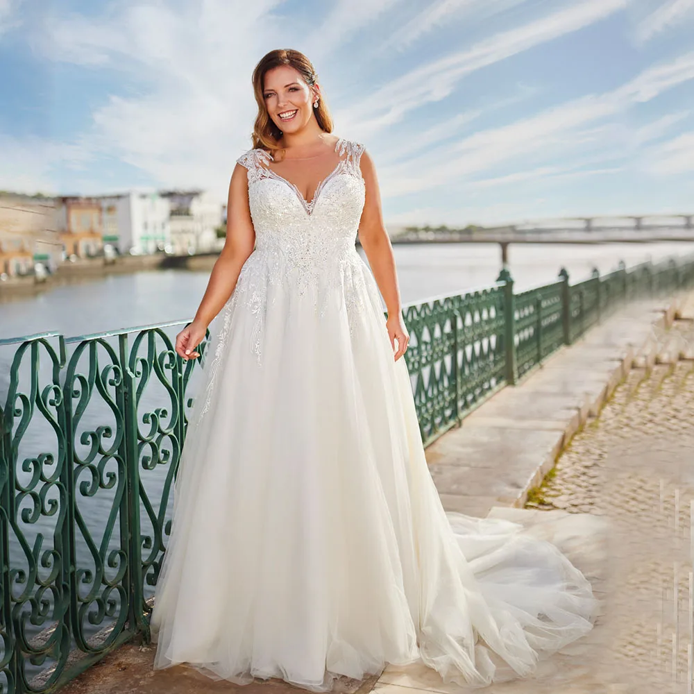 

Elegant Wedding Dresses Plus Size V-Neck Backless Cap Sleeves Bride Gowns Lace Applique A-Line Sweep Train فستان حفلات الزفاف