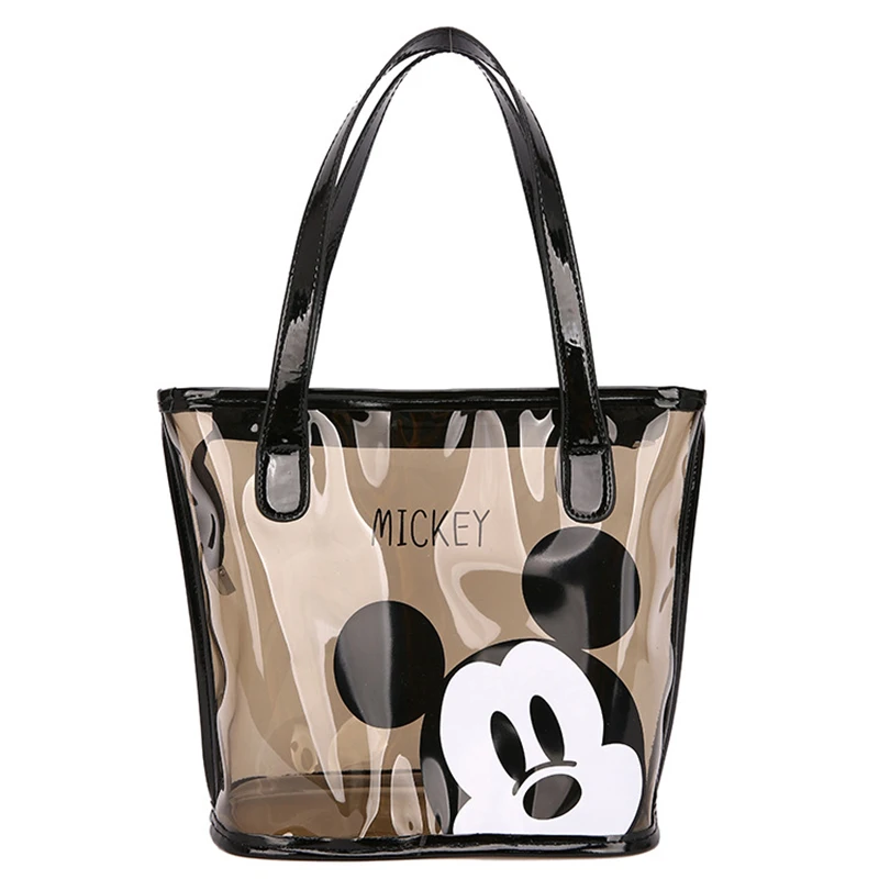 

Disney New women bag Mickey Mouse transparent jelly bag cartoon printed handbag Korean cute one shoulder bag slant cross bag