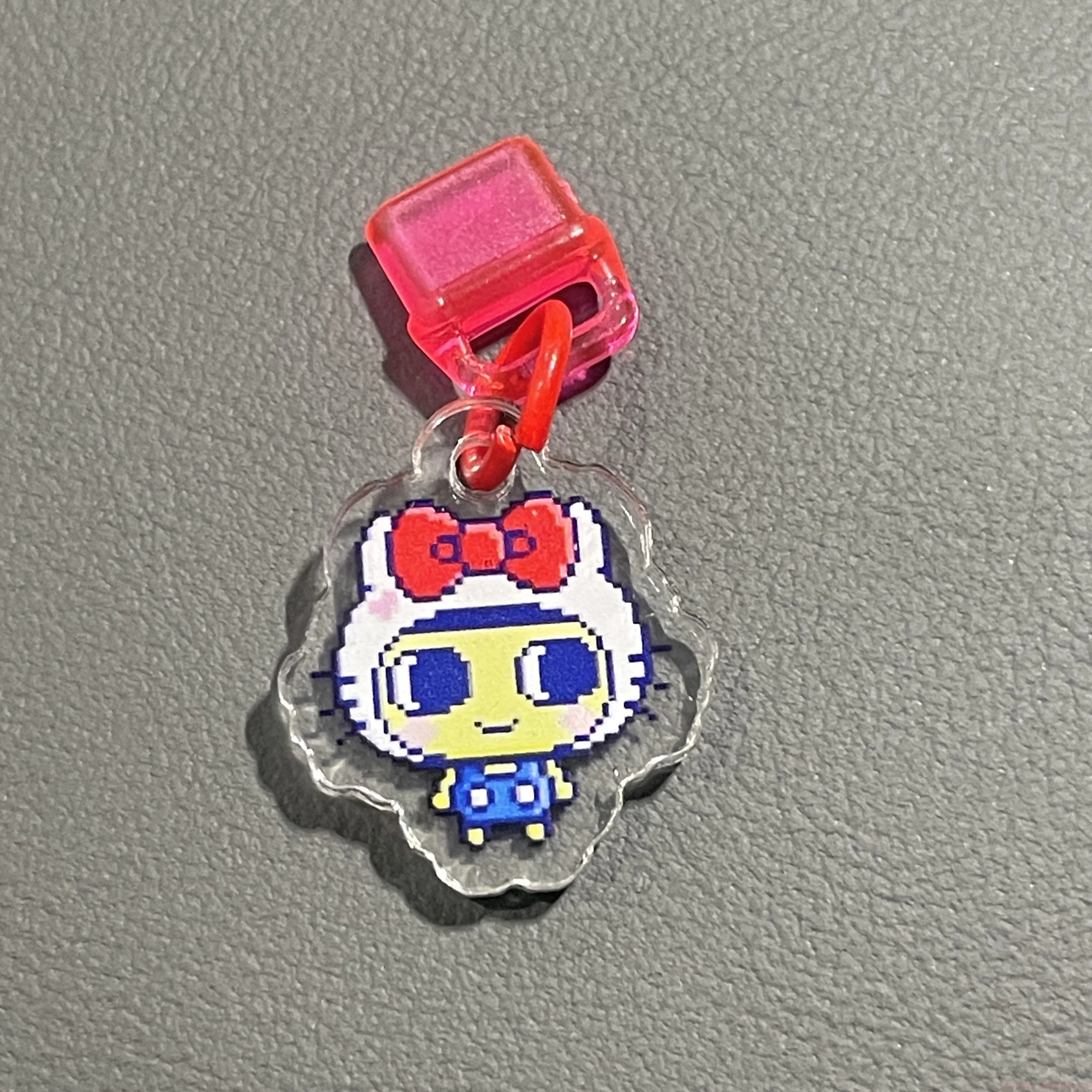 Пылезащитная заглушка Tamagotchi Uni Sanrio Angel Uni, подвесная заглушка типа C (art.: 3920cc877fbdc) - 3920cc877fbdc