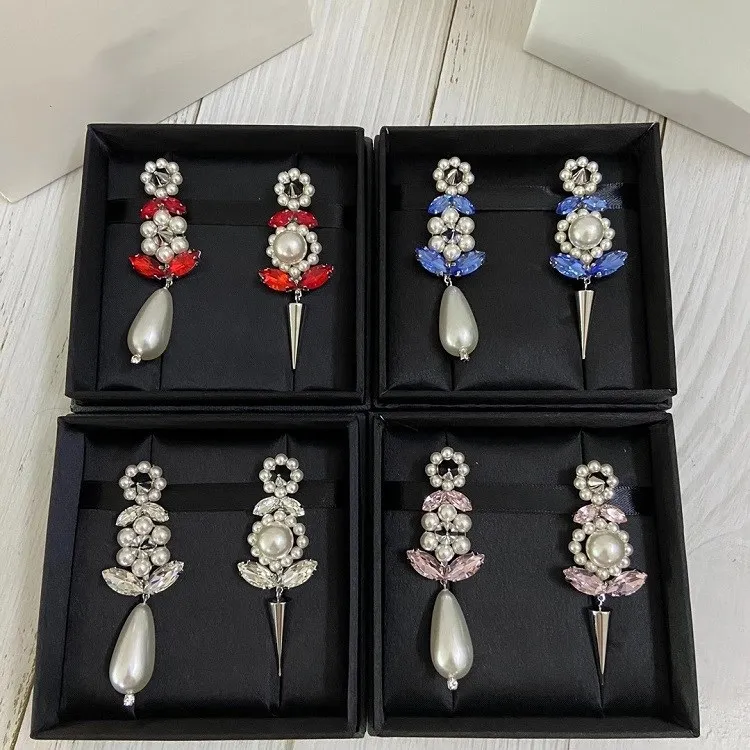

European and American simple Korean version girl flower lady color asymmetric earrings