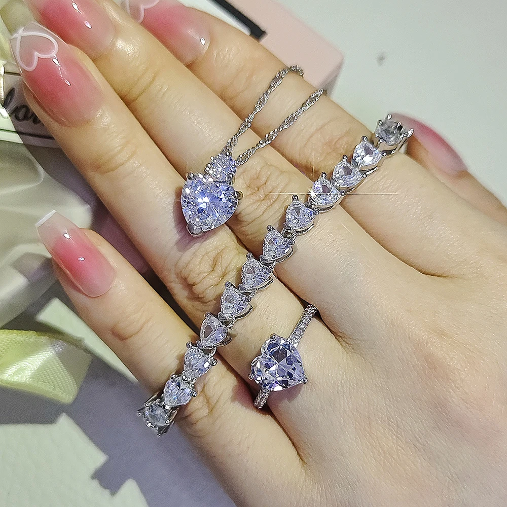 

Комплект из кольца и серёг, серебристого цвета, для невесты
