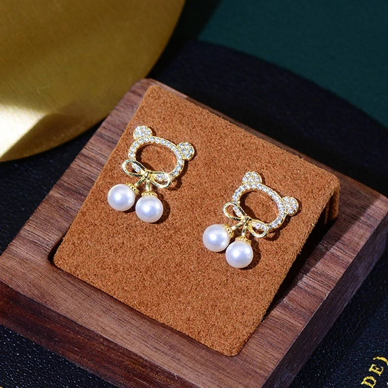 

Cute Tiny Hollow Bear Earring for Femme Temperament Bowknot Pearl Stud Earrings Minimalist Bizuteria Orecchini Jewelry