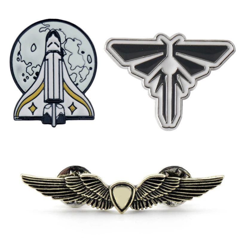 

New Brooch The Last of Us 2 Ellie Pins Gold Plated Wings Rocket Spaceship Badge Brooches for Fans Cosplay Jewelry Friends Gift