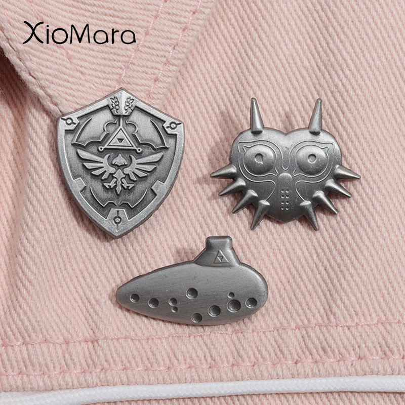 

Zelda Breath of the Wild Hylian Shield Enamel Pin Majoras Mask Classic Game Weapon Souvenir Brooch Lapel Badge Best Friend Gifts