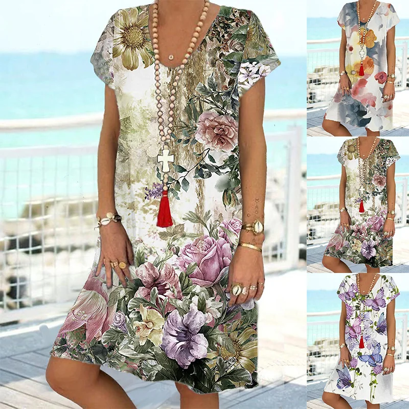 

Женское платье средней длины с V-образным вырезом и коротким рукавом