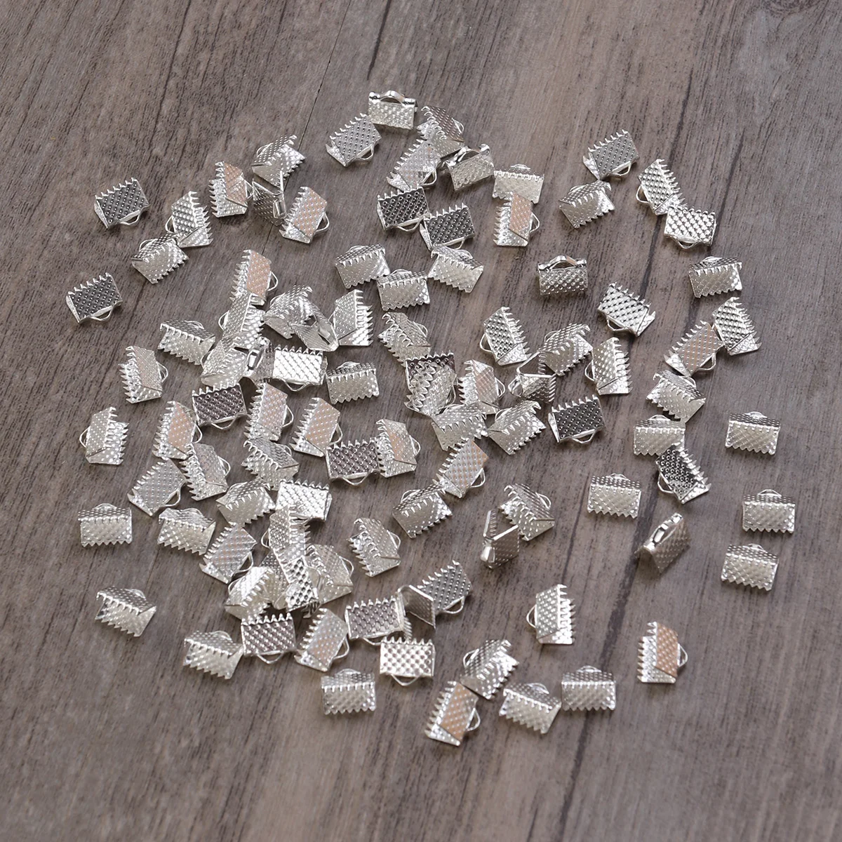 100 шт. ленты текстурированные обжимные концевые зажимы пряжки Mazi посеребренные