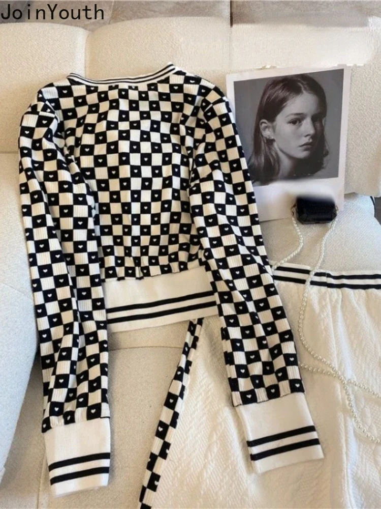 Женский брючный костюм с V-образным вырезом в клетку