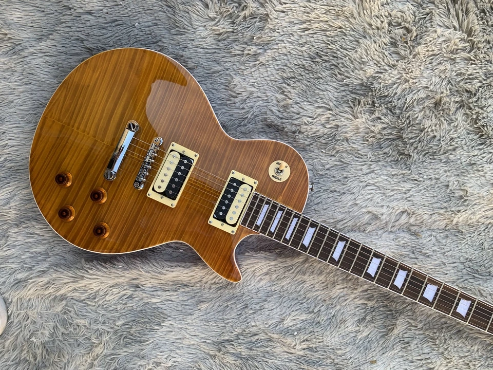 

In stock Classic LP electric guitar, classic open pickup, selected tiger skin texture surface, rock tone, free delivery home.