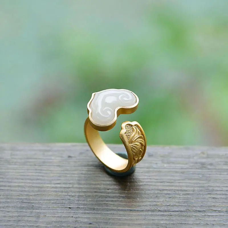 

Unique and creative new natural Hetian white jade auspicious cloud opening adjustable exquisite and elegant ladies ring