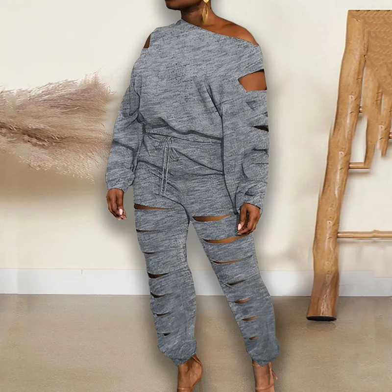 

Модный однотонный комплект из двух предметов с вырезами, Осенний Свободный свитшот и длинные брюки, новинка 2022, винтажные складки, женская с...