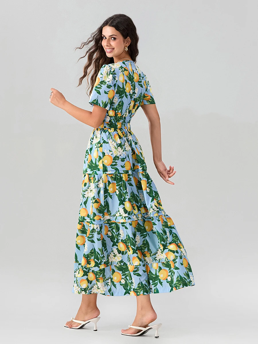 Женское длинное платье с заклепками на подоле V-образным вырезом и коротким