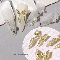 50 pcs goldsilver alloy ribbon bowknot nail art decoration luxury metal bow ties ornament nail charms delicate manicure jewelry