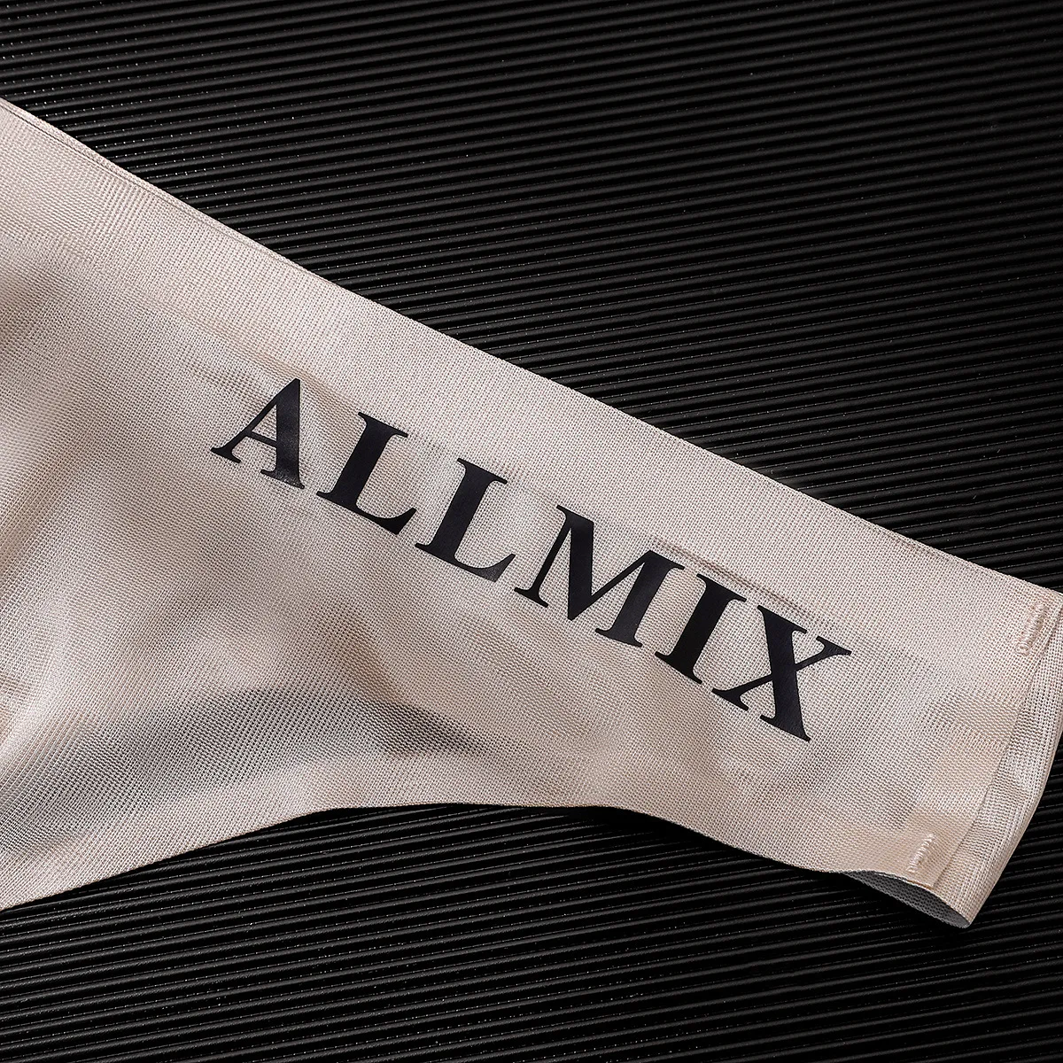 Foreign trade men's sexy sports fitness letter thin transparent buttocks ice silk low waist non-marking triangle single thong