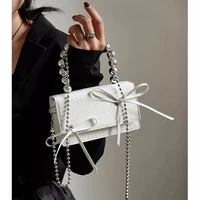 2022 new shoulder bag niche designer temperament bag female korean bow chain mini portable messenger bag