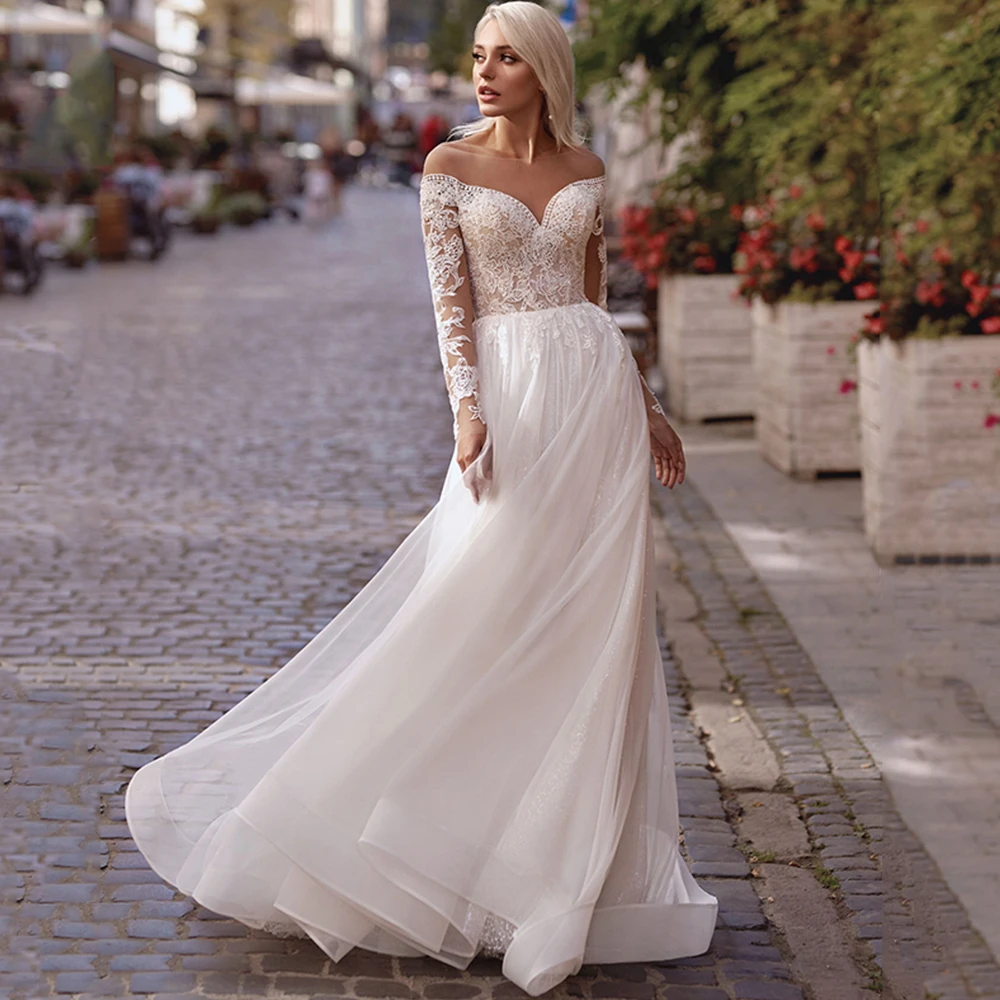 

Boho Bridal Gowns 2022 Long Sleeves Button O-Neck A-Line Wedding Dresses Lace Appliques Sweep Train Backless Vestido De Noiva
