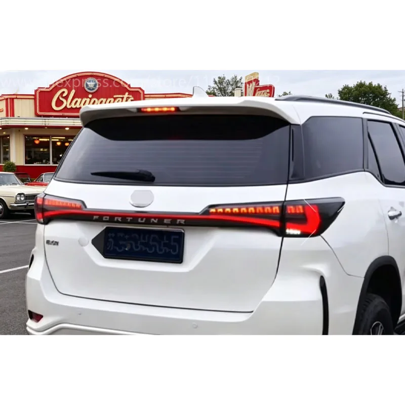 Подходит для Toyota Fortuner 2016-2021 годов выпуска, улучшенный задний спойлер со светодиодными стоп-сигналами, дневными ходовыми огнями и бампером. (art.: 3920da686288e) - 3920da686288e