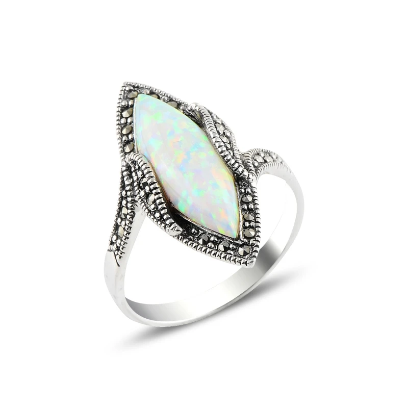 

Серебряное кольцо с искусственным жемчугом и марказитом