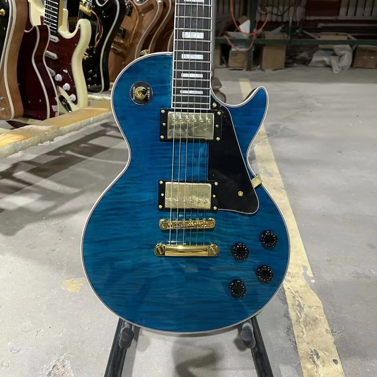 

Custom Electric Guitar Flamed Maple Top Transparent Blue Color Golden Hardware Rosewood Fingeboard Mahogany Body Free Shipping