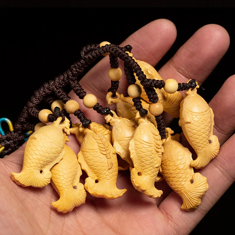 

A Group of Fish Lucky Mascot Animal Figurines Wood Statue Chinese Creative Wooden Pendant In Car Decoration