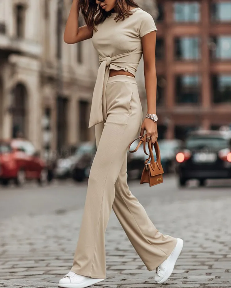 

Женский модный повседневный костюм из двух предметов, однотонные брюки абрикосового цвета с высокой талией и коротким рукавом, спортивный ...